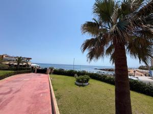 Stylish Frontline Punta Prima Suite with Sea Views
