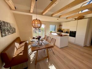 Deichkoje 12 - Deck 2 Ferienwohnung mit Sauna und Balkon mit Eiderblick in Tönning