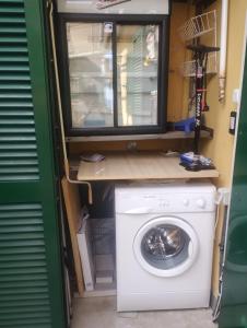 Bilocale con giardino, vista mare e parcheggio privato