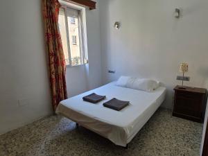 Preciosa Habitación privada comoda relajante ideal para pasar muy buenas vacaciones Wi-Fi centro malaga