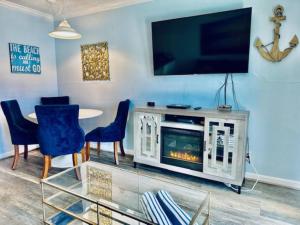 Sandy Seawall Escape Resort