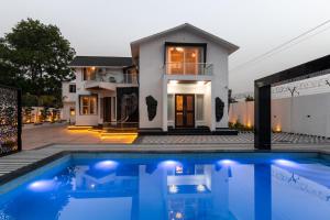 ELIVAAS Signature Raj Farms 3BHK Villa with Private Swimming Pool, Kids Room and An Outhouse