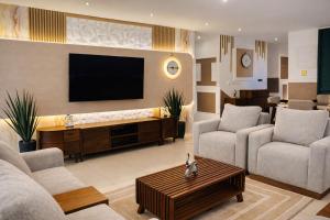 Luxury Furnished 3BR Oasis Apartment with Partial Sea View