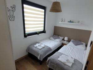 Bałtycka Oaza Jastrzębia Góra - Apartament z ogródkiem, Basen, Sauna, Jacuzzi
