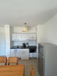 Appartement lumineux 2 chambres - plage et piscine