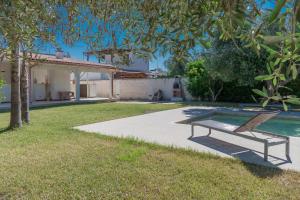 Villa IslaMaris con Piscina nel Boomerang Village a Torre Colimena