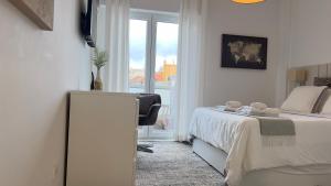 Quarto com casa de banho privativo
