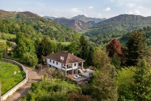 Casa Raíz y Cumbre