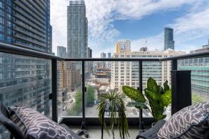 Modern Downtown Studio with Balcony & City Views