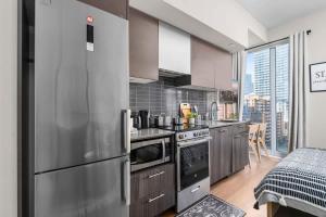 Modern Downtown Studio with Balcony & City Views