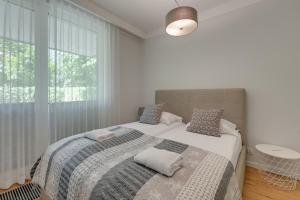 Tre Mare z ogrodem 2 by Grand Apartments