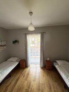 Apartament pod Dębami
