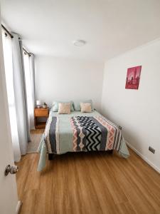 departamento cómodo, central con estacionamiento