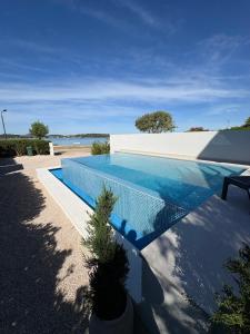 Apartment Lydia with private pool on the beach