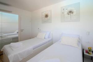 Vacation apartments Mario with salt water pool