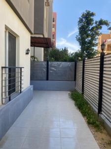Stylish 2-Bedroom Apartment in Haram Life Compound with Private Entrance