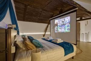 LAtoll - Balnéo - Sauna - Vidéo Projecteur