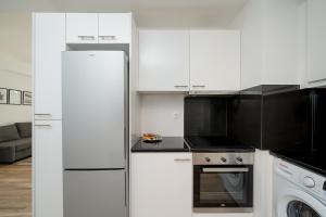 Riviera 1BR - 8 min Niarchos SNFCC by TwentyTwo