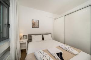 Riviera 1BR - 8 min Niarchos SNFCC by TwentyTwo