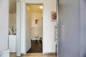 Stylisches Studio Apartment mit Balkon und privatem Stellplatz für bis zu 4 Personen nur wenige Minuten von der Innenstadt & Mosel entfernt