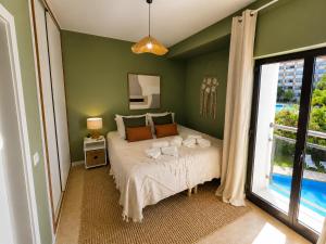 Vilamoura Condominium with Parking and Pool - 1 Bedroom Apartment with Large Sofa-bed, Private Balconies with Pool view, near The Marina & Beaches