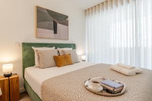 Premium Living with Pool, Balcony, Gym & Garage by HostWise