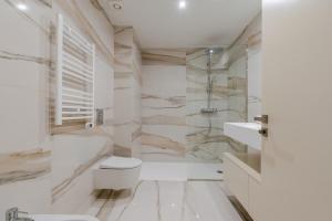 Premium Living with Pool, Balcony, Gym & Garage by HostWise