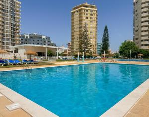 BnB Homes vibrant Ocean View terraced apartment with swimming pool 200 m to the beaches