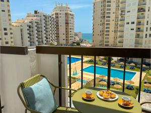 BnB Homes vibrant Ocean View terraced apartment with swimming pool 200 m to the beaches