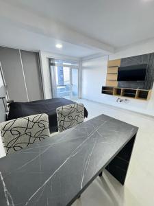 Moderno Monoambiente Centrico 3B