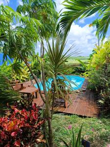 Gites kaz à klemence - Bungalow karapat - jacuzzi privé et piscine partagée au cœur de la nature à Anse-Bertrand