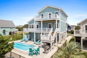 Coastal Chaos 303 Sand Piper Ln, home