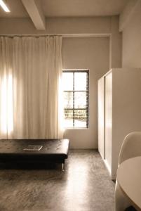 Bauhaus Loft Bacolod with Private Patio at Helvetia, Upper East, NGC