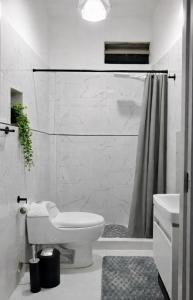 Habitación con balcón en el corazón de la ciudad