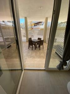 SEAL DOMO - Appartamento con Patio e Parcheggio Privato a Cagliari