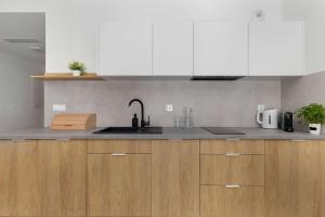Elegant Apartments in Mielno with Rooftop Seasonal Pool by Noclegi Renters
