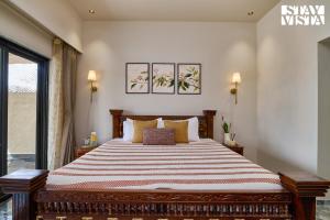 StayVistas Solmira Haven - 4BHK Villa with Infinity Pool & Sports Turf