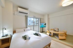Hotel HIRAKU RYUKYU -STYLE-