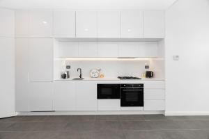 Central 2BR Retreat -Near Train, University & Mall