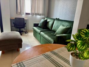 Flat confortável com recepção 24h e vaga de garagem