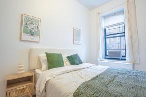 Charm 2Bd in Upper East Side with Backyard