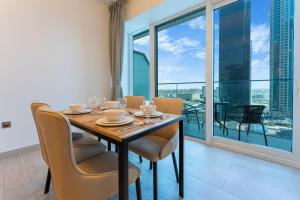 Vacationer Holiday Homes l Minimalistic 1 Bedroom l City Views l JLT