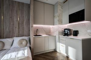 Apartamenty ARTE - Rezydencja Ogród Saski 33 - Faktura VAT