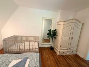 WALD & WELLE Ferienhaus mit Garten Superior-Appartement Ostsee Strand in 850m