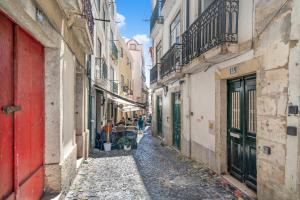 Sunny Balcony in Historic Lisbon | Homeful Homes