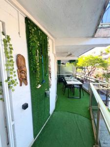 Tropical Suite terraza con Minigolf