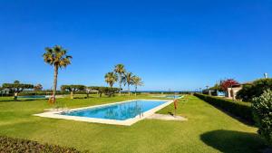 Vera Playa Beachfront Apartment with Garden and 4 Pools