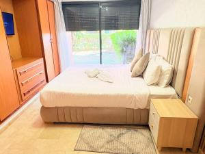 Fabuleux appartement, rez de jardin au sein de la palmeraie