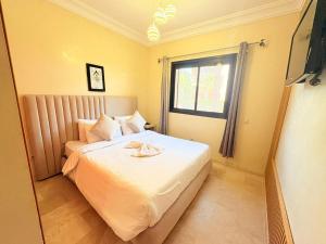 Fabuleux appartement, rez de jardin au sein de la palmeraie