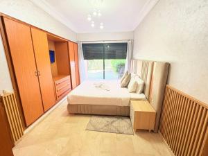 Fabuleux appartement, rez de jardin au sein de la palmeraie
